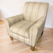 A contemporary Next armchair in striped fabric, width 78 cm.