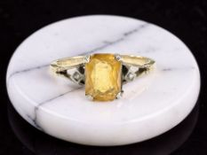 A 9ct gold citrine ring, size Q CONDITION REPORT: Shank gold, setting silver. 2.