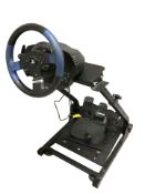 A Playstation gaming steering wheel and pedals.