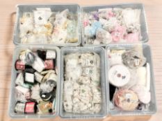 A large quantity of craft materials including sequins and beads, ribbons, etc.