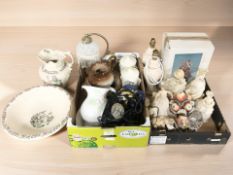 A group of figurines, lamp bases, storage jars, rotary telephone, etc.