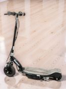 A Razor electric scooter with lead.