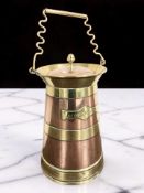 A brass and copper lidded vessel stamped 'Jeffrey Rusbridge, Owl Works, Oldham',
