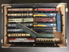 A collection of unboxed OO gauge rolling stock including Hornby.