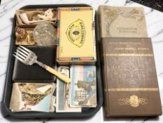 Two Meerschaum pipes, antiquarian colour postcards, cigar box,