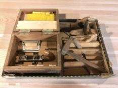 A group of antique woodworking planes, Stanley combination plane in box, etc.