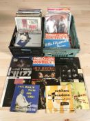A collection of vinyl LP records including jazz.