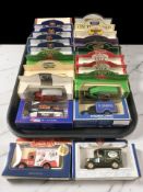 Twenty boxed die cast delivery vans and other vehicles including Oxford and Lledo.
