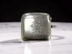 A silver vesta case,