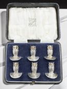 A set of six George V silver menu card holders modelled as owls, Sampson Mordan & Co Ltd,