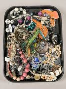 A tray of costume jewellery, beads, necklaces,
