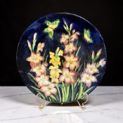 A Maling lustre cabinet plate depicting butterflies, diameter 29 cm.