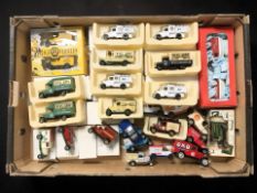 Boxed and unboxed die cast delivery vans and other vehicles including Days Gone, etc.