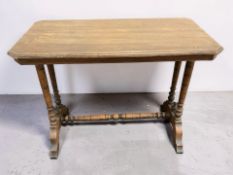 A late Victorian oak occasional table, width 92 cm.