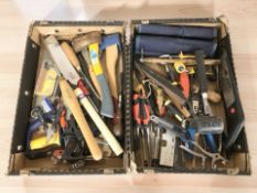 Assorted modern hand tools and hardware.