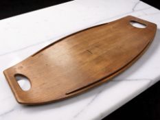 A 20th century Danish curved teak twin handled serving tray, stamped Dansk Designs, Denmark,