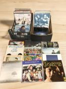 Vinyl LP records including The Beatles, The Doors, Chris Rea, Elton John, Art Garfunkel, Genesis,