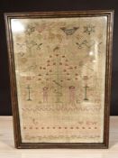 A William IV Adam and Eve sampler, worked by Mary Ann Wilson, aged 14, 37 cm x 25 cm, framed.
