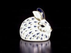 A Royal Crown Derby Rabbit paperweight, with gold stopper and original box.