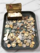 A collection of coins and tokens, crowns, tin of loose stamps, etc.