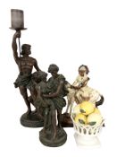 A composition figural candle stand, overall 73 cm high, a further similar figure,
