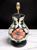 A Moorcroft Poppy table lamp, height 35 cm including fitting.