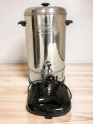 A Swan stainless steel hot water urn, together with a toastie maker.