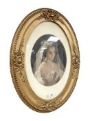 A 19th century print depicting a lady wearing a veiled dress, in a convex glass frame,