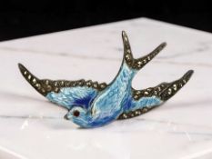 A silver, marcasite and enamel bird brooch, width 5.