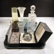A Caithness paperweight in box, Swarovski crystal train with box, drinking glasses, decanter,