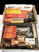 A collection of Hornby Tri-Ang railway components including various buildings and models, track,