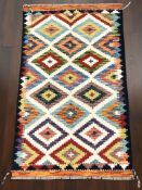 A Chobi Kilim rug, 126 cm x 79 cm.