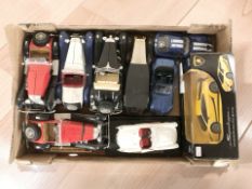 A group of scale model classic cars including Bburago.