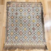 An antique flatweave Kilim, 136 cm x 105 cm.