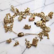 A 9ct gold charm bracelet and several loose charms CONDITION REPORT: 29.