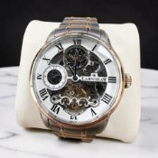 A gent's stainless steel and gold-plated Earnshaw automatic wristwatch with visible movement,