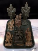 Seven Oriental carved hardwood statues.