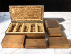 An oak jewellery box and several other antique wooden table boxes.