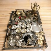 A collection of EPNS wares including various goblets and dishes, brass items, cutlery,