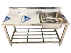 A stainless steel commercial sink unit with undershelf, width 120 cm.