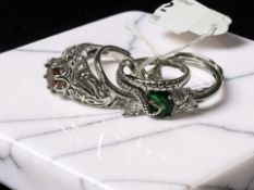 Five silver gem set dress rings.