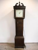 An early 19th century oak thirty hour long case clock,