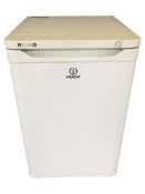 An Indesit under bench freezer.