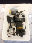 A group of remote control hand sets and related components.