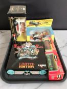 A Bburago 1:24 scale Chevrolet Corvette 1957, two further Bburago vehicles,