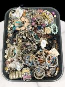 A tray of costume jewellery, beads, necklaces,