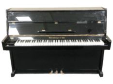 A Rich Neinmeyer & Sohn overstrung upright piano, numbered 912170, in high gloss black case,