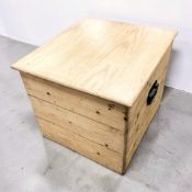 A late Victorian pine box with hinged lid, width 51 cm.