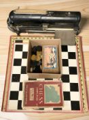An early 20th century Halsby & Co Protectograph cheque writer, together with a group of chess piece,
