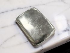 A silver cigarette case, Birmingham 1906,